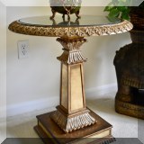 F19. Round pedestal table. 26”h x 24”w 